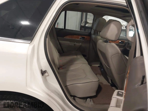 2013 Lincoln MKX with VIN 2LMDJ8JK4DBL60499, listed as a IAAI auction lot 41816339 with 132,061 mi miles. Bid and sale history available at carsss.com. Image 8.