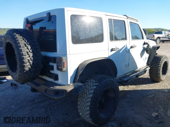2016 Jeep Wrangler Unlimited Sahara with VIN 1C4BJWEG5GL243004, listed as a IAAI auction lot 40438321 with 121,360 mi miles and . Bid and sale history available at DreamBid. Image 4.