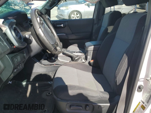 2020 Toyota Tacoma SR5 with VIN 3TMAZ5CN8LM115056, listed as a Copart auction lot 46948805 with 87,713 mi miles and Salvage title. Bid and sale history available at DreamBid. Image 7.