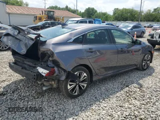 2018 Honda Civic EX-T z VIN JHMFC1F33JX015382, wystawiony jako Copart lot #56544985 z przebiegiem 71 383 mil mil oraz Szkoda całkowita • Salvage title. Historia ofert i sprzedaży dostępna na DreamBid. Obrazek 3.