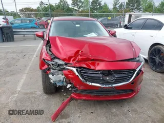 2016 Mazda 6 i Grand Touring with VIN JM1GJ1W57G1460281, listed as a IAAI auction lot 42016051 with 89,784 mi miles. Bid and sale history available at carsss.com. Image 12.