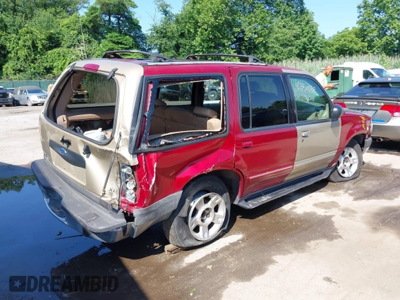 2001 Ford Explorer XLT z VIN 1FMZU73E01ZA05817, wystawiony jako IAAI lot #42550182 z przebiegiem 185 304 mil mil oraz . Historia ofert i sprzedaży dostępna na DreamBid. Obrazek 4.