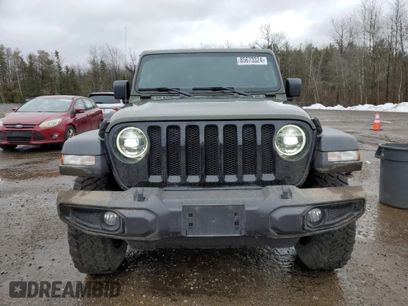 2021 Jeep Wrangler Sport S with VIN 1C4HJXAG3MW617318, listed as a Copart auction lot 85673324 with 66,450 mi miles and Salvage Title. Bid and sale history available at DreamBid. Image 5.