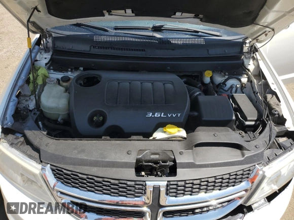 2015 Dodge Journey SXT with VIN 3C4PDCBG5FT628212, listed as a Copart auction lot 60663695 with 145,024 mi miles and Salvage title. Bid and sale history available at DreamBid. Image 11.