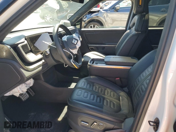 2024 Rivian R1S Adventure z VIN 7PDSGABA7RN034025, wystawiony jako Copart lot #49332795 z przebiegiem Nie podano mil oraz Szkody całkowita. Historia ofert i sprzedaży dostępna na DreamBid. Obrazek 7.