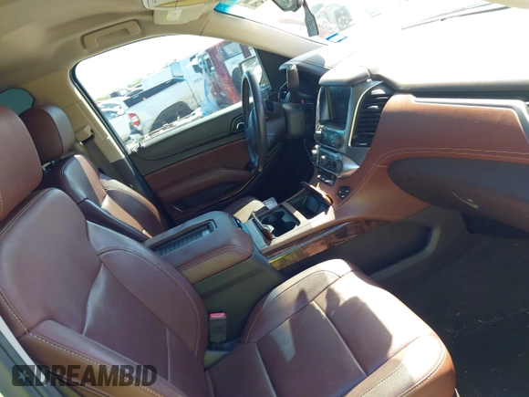 2016 Chevrolet Tahoe LTZ with VIN 1GNSCCKC1GR404754, listed as a IAAI auction lot 41831879 with 139,681 mi miles and . Bid and sale history available at DreamBid. Image 5.