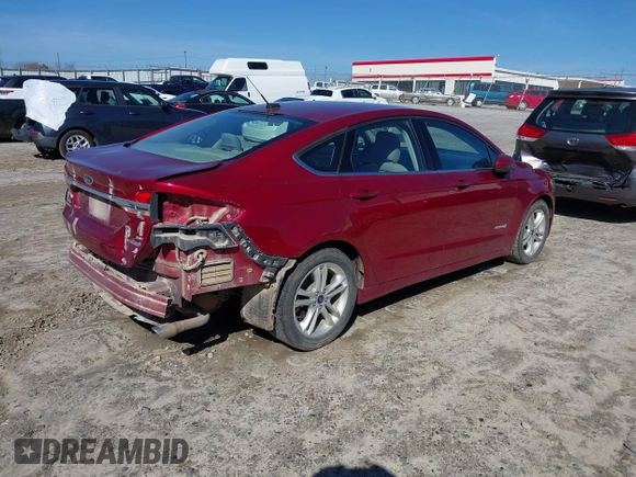 2018 Ford Fusion Hybrid SE with VIN 3FA6P0LU1JR243022, listed as a IAAI auction lot 41470052 with 119,636 mi miles. Bid and sale history available at carsss.com. Image 4.
