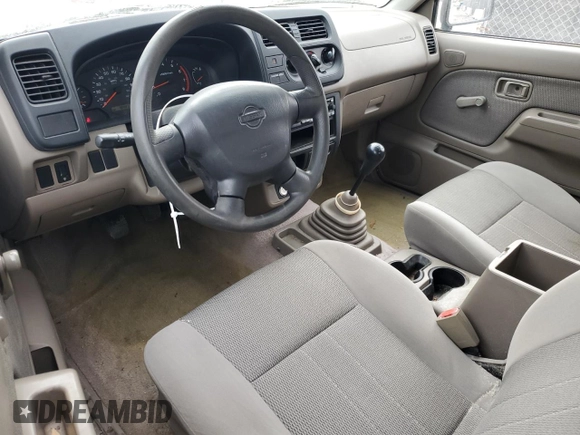 2001 Nissan Frontier XE with VIN 1N6DD26S91C398560, listed as a Copart auction lot 87893925 with 184,831 mi miles and Salvage title. Bid and sale history available at DreamBid. Image 8.