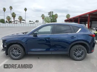 2020 Mazda CX-5 Touring with VIN JM3KFACM2L0856777, listed as a IAAI auction lot 42073972 with 151,628 mi miles. Bid and sale history available at carsss.com. Image 15.