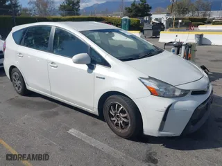 2017 Toyota Prius v Two with VIN JTDZN3EU9HJ063285, listed as a IAAI auction lot 41696704 with 411,285 mi miles. Bid and sale history available at carsss.com. Image 1.