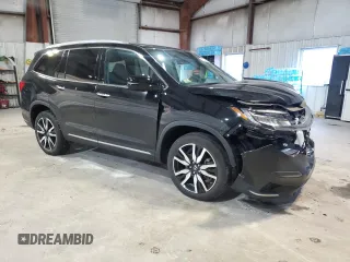 2021 Honda Pilot Touring 7-Passenger z VIN 5FNYF6H62MB079918, wystawiony jako Copart lot #53272865 z przebiegiem 29 581 mil mil oraz Szkoda całkowita • Salvage title. Historia ofert i sprzedaży dostępna na DreamBid. Obrazek 4.