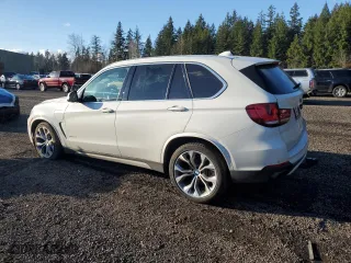 2017 BMW X5 xDrive40e iPerformance with VIN 5UXKT0C50H0S79726, listed as a Copart auction lot 48129805 with 64,853 mi miles and Salvage Title. Bid and sale history available at carsss.com. Image 2.