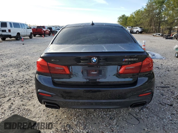 2020 BMW 5 Series M550i xDrive with VIN WBAJS7C01LCD23365, listed as a Copart auction lot 88302885 with Not provided miles and Salvage title. Bid and sale history available at DreamBid. Image 6.