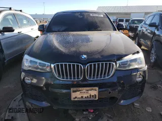 2015 BMW X4 xDrive35i with VIN 5UXXW5C56F0E87474, listed as a Copart auction lot 39752004 with 116,806 mi miles. Bid and sale history available at carsss.com. Image 5.