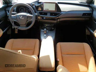2025 Lexus UX with VIN JTHUCJDH6S2007491, listed as a Copart auction lot 52997175 with 1,042 mi miles and Salvage Title. Bid and sale history available at carsss.com. Image 8.