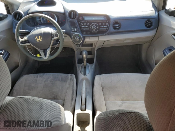 2010 Honda Insight LX with VIN JHMZE2H50AS009869, listed as a Copart auction lot 53031515 with 194,860 mi miles and Salvage Title. Bid and sale history available at DreamBid. Image 8.