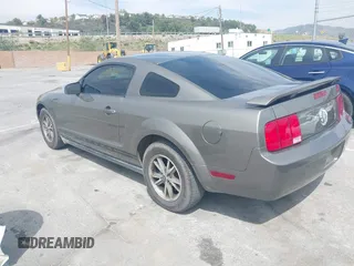 2005 Ford Mustang Deluxe with VIN 1ZVFT80N355185003, listed as a IAAI auction lot 42030961 with 219,973 mi miles. Bid and sale history available at carsss.com. Image 3.