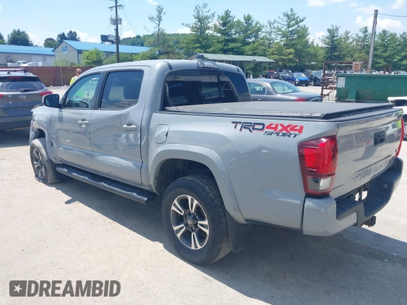2019 Toyota Tacoma SR with VIN 3TMCZ5AN1KM274625, listed as a IAAI auction lot 42660593 with 163,460 mi miles and . Bid and sale history available at DreamBid. Image 3.