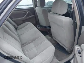 2001 Toyota Camry CE z VIN 4T1BG22K01U847704, wystawiony jako IAAI lot #41583762 z przebiegiem Nie podano mil oraz . Historia ofert i sprzedaży dostępna na DreamBid. Obrazek 8.