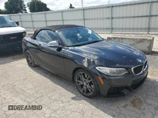 2016 BMW 2 Series M235i with VIN WBA1M1C52GV394388, listed as a Copart auction lot 73257804 with 87,391 mi miles and Salvage Title. Bid and sale history available at carsss.com. Image 4.