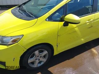 2016 Honda Fit LX with VIN JHMGK5H56GX011347, listed as a IAAI auction lot 42067854 with 106,969 mi miles and . Bid and sale history available at DreamBid. Image 6.