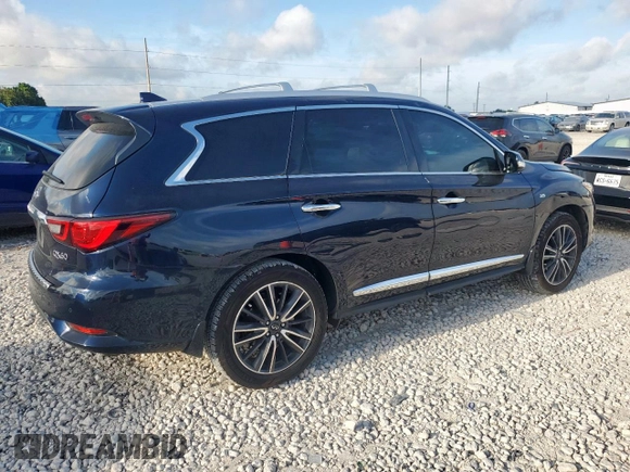 2020 Infiniti QX60 Luxe with VIN 5N1DL0MN2LC545517, listed as a Copart auction lot 65957365 with 93,656 mi miles and Salvage title. Bid and sale history available at DreamBid. Image 3.
