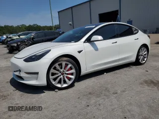 2021 Tesla Model 3 Long Range z VIN 5YJ3E1EB7MF093184, wystawiony jako Copart lot #58060385 z przebiegiem 51 678 mil mil oraz Nie do naprawy • Non repairable. Historia ofert i sprzedaży dostępna na DreamBid. Obrazek 1.