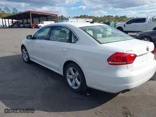 2013 Volkswagen Passat SE w/Sunroof with VIN 1VWBH7A30DC080176, listed as a IAAI auction lot 40941070 with 155,815 mi miles. Bid and sale history available at carsss.com. Image 3.