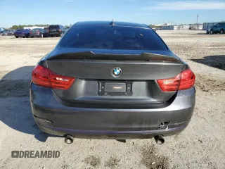2015 BMW 4 Series 435i xDrive z VIN WBA3R5C56FK371987, wystawiony jako Copart lot #88077015 z przebiegiem Nie podano mil oraz Szkoda całkowita • Salvage title. Historia ofert i sprzedaży dostępna na DreamBid. Obrazek 6.