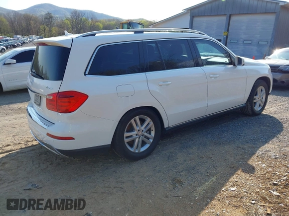 2014 Mercedes-Benz GL-Class GL 450 with VIN 4JGDF7CE5EA430524, listed as a IAAI auction lot 42020941 with 84,544 mi miles. Bid and sale history available at carsss.com. Image 4.