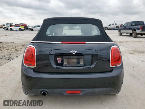 2019 MINI Convertible Cooper с VIN WMWWG5C5XK3E22725, выставлен на аукционе Copart как лот 54779825 с пробегом 43 586 миль миль и Списание • Salvage title. История ставок и продаж доступна на DreamBid. Изображение 6.