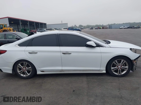 2019 Hyundai Sonata SEL with VIN 5NPE34AF3KH732362, listed as a IAAI auction lot 41918417 with 146,856 mi miles and . Bid and sale history available at DreamBid. Image 14.