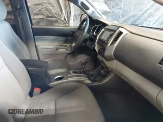 2014 Toyota Tacoma with VIN 3TMLU4EN4EM156933, listed as a IAAI auction lot 41197904 with 128,183 mi miles. Bid and sale history available at carsss.com. Image 5.