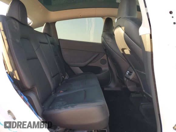 2023 Tesla Model Y Long Range z VIN 7SAYGDEE8PA069248, wystawiony jako Copart lot #74120944 z przebiegiem 17 085 mil mil oraz Szkoda całkowita • Salvage title. Historia ofert i sprzedaży dostępna na DreamBid. Obrazek 10.
