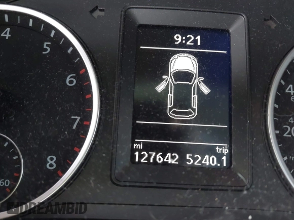 2015 Volkswagen Tiguan SE z VIN WVGBV7AX8FW582171, wystawiony jako IAAI lot #41442290 z przebiegiem 127 642 mil mil oraz . Historia ofert i sprzedaży dostępna na DreamBid. Obrazek 14.