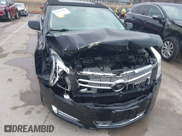 2013 Cadillac XTS Platinum z VIN 2G61V5S37D9194227, wystawiony jako IAAI lot #41510449 z przebiegiem 114 243 mil mil oraz . Historia ofert i sprzedaży dostępna na DreamBid. Obrazek 6.