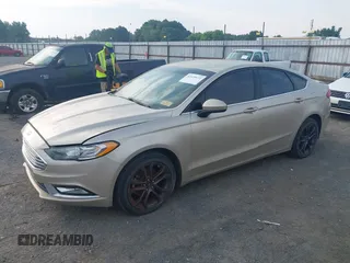 2018 Ford Fusion SE z VIN 3FA6P0HD6JR279927, wystawiony jako IAAI lot #42430172 z przebiegiem 145 080 mil mil oraz . Historia ofert i sprzedaży dostępna na DreamBid. Obrazek 2.