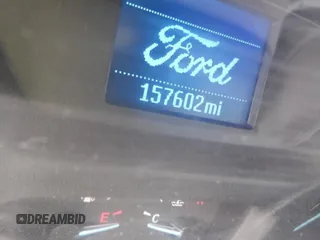 2018 Ford Transit with VIN 1FTYE1YMXJKB52083, listed as a IAAI auction lot 42207104 with 157,602 mi miles. Bid and sale history available at carsss.com. Image 1.