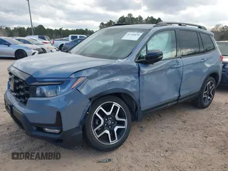 2023 Honda Passport Elite with VIN 5FNYF8H09PB001292, listed as a IAAI auction lot 41719875 with 37,537 mi miles and . Bid and sale history available at carsss.com. Image 2.