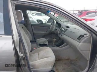 2004 Toyota Camry LE with VIN 4T1BE32K64U868802, listed as a IAAI auction lot 42141061 with 254,215 mi miles. Bid and sale history available at carsss.com. Image 5.