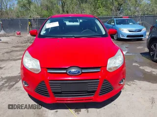 2012 Ford Focus SE z VIN 1FAHP3F23CL333598, wystawiony jako IAAI lot #41970172 z przebiegiem 209 969 mil mil oraz . Historia ofert i sprzedaży dostępna na DreamBid. Obrazek 13.