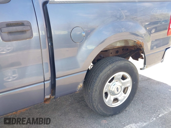 2004 Ford F-150 XLT with VIN 1FTRW14W24KA27415, listed as a IAAI auction lot 42081888 with 149,897 mi miles. Bid and sale history available at carsss.com. Image 14.
