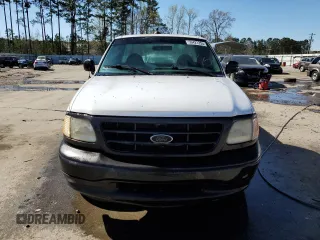 2001 Ford F-150 XL z VIN 1FTZF17231NA07581, wystawiony jako Copart lot #50421255 z przebiegiem 316 753 mil mil oraz Szkoda całkowita • Salvage title. Historia ofert i sprzedaży dostępna na DreamBid. Obrazek 5.