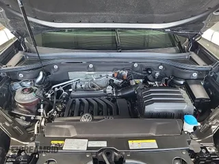 2023 Volkswagen Atlas SE z VIN 1V2HR2CA5PC526012, wystawiony jako IAAI lot #42796408 z przebiegiem 41 216 mil mil oraz . Historia ofert i sprzedaży dostępna na DreamBid. Obrazek 9.
