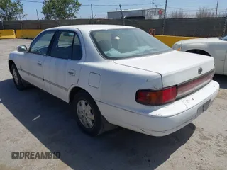 1993 Toyota Camry LE z VIN JT2SK12E0P0143650, wystawiony jako IAAI lot #42345181 z przebiegiem 264 350 mil mil oraz . Historia ofert i sprzedaży dostępna na DreamBid. Obrazek 3.