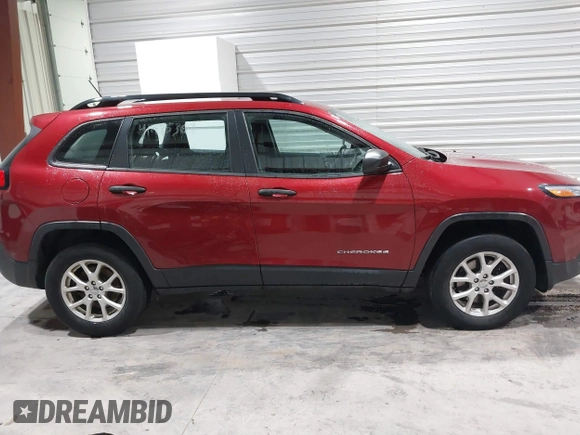 2015 Jeep Cherokee Sport with VIN 1C4PJMAB8FW719652, listed as a IAAI auction lot 41475308 with 247,960 mi miles. Bid and sale history available at carsss.com. Image 13.