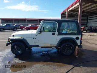 2004 Jeep Wrangler X z VIN 1J4FA39S04P747828, wystawiony jako IAAI lot #41484240 z przebiegiem Nie podano mil oraz . Historia ofert i sprzedaży dostępna na DreamBid. Obrazek 15.