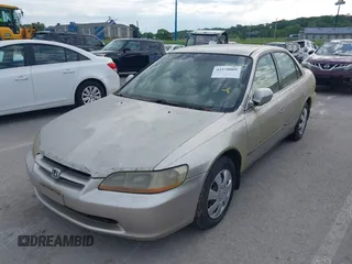 1999 Honda Accord LX with VIN JHMCG5642XC003361, listed as a IAAI auction lot 42270009 with 160,706 mi miles and . Bid and sale history available at DreamBid. Image 2.