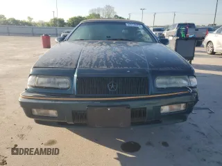 1994 Chrysler LeBaron z VIN 1C3EU4537RF286710, wystawiony jako Copart lot #52610475 z przebiegiem 64 533 mil mil oraz Szkody całkowita. Historia ofert i sprzedaży dostępna na DreamBid. Obrazek 5.