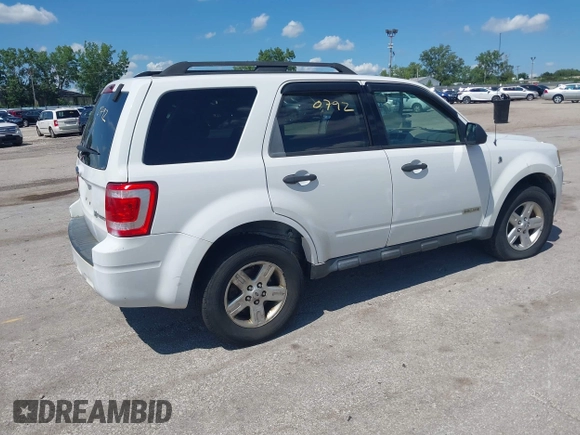 2008 Ford Escape Hybrid with VIN 1FMCU59H98KB58534, listed as a IAAI auction lot 42630792 with 126,993 mi miles and . Bid and sale history available at DreamBid. Image 4.